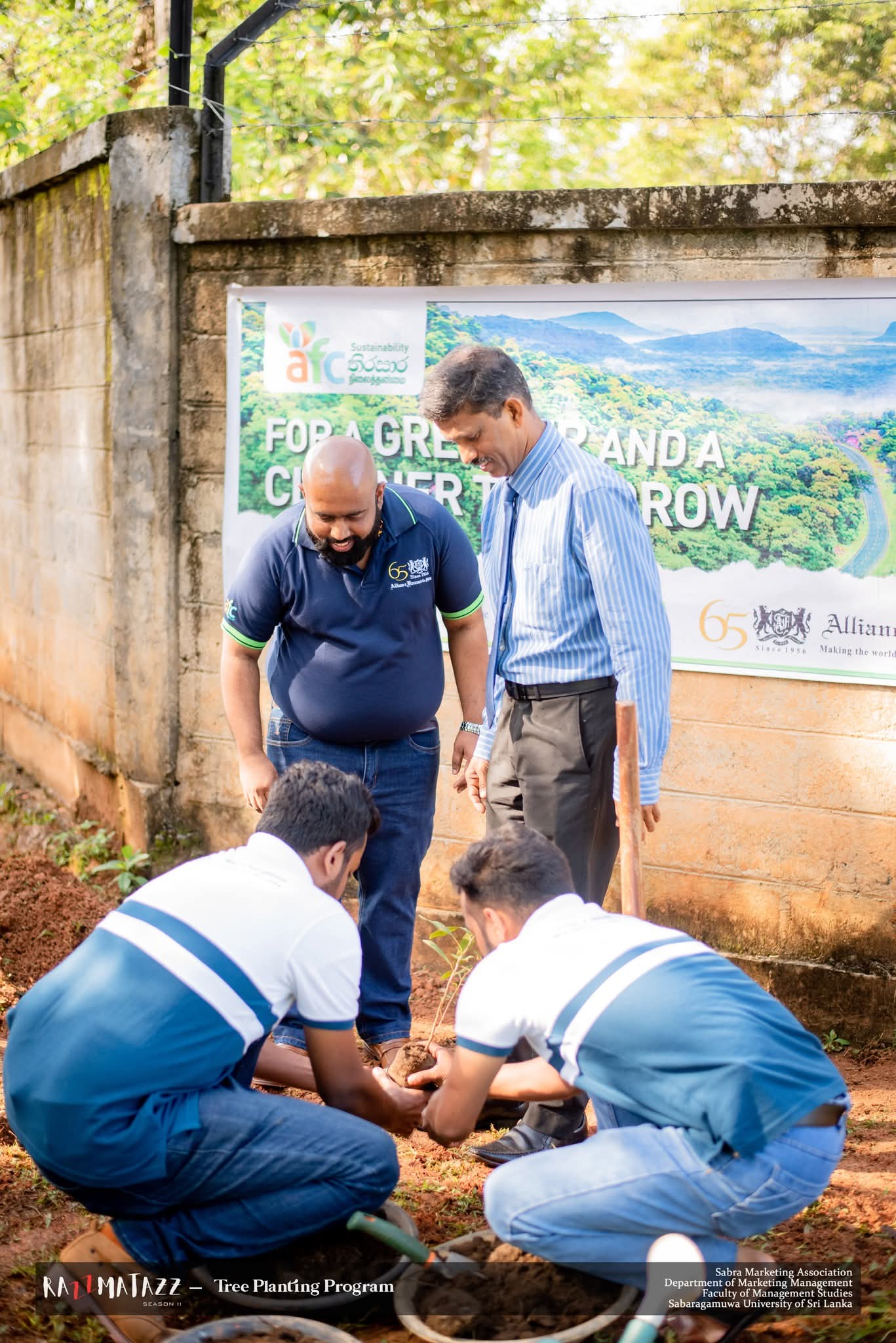 Planting Hope for a Greener Tomorrow | Razzmatazz Season II  In a heartfelt gesture towards a sustainable future, we proudly planted trees at the Faculty of Management Studies on March 4th, 2025. Marking a memorable moment of Razzmatazz Season II  This meaningful initiative was made possible in collaboration with our esteemed Platinum Sponsor, Alliance Finance Company. Together, we sowed the seeds of hope, growth, and responsibility.  Swipe through to witness how we turned commitment into action, one tree a